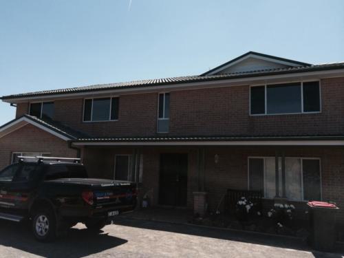 Solar film on top of house bottom of house left untinted